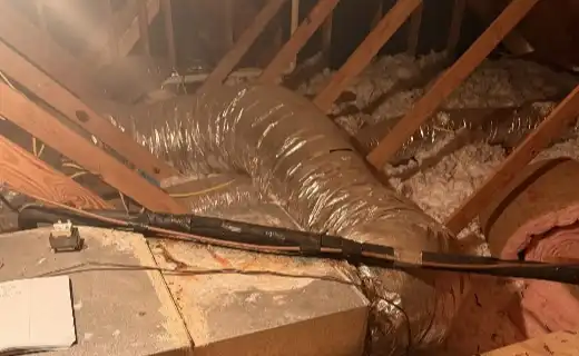 HVAC ductwork routed through a home attic during installation